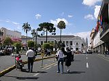 Ecuador Quito 02-08 Old Quito Plaza Grande City Hall And Basilica The City Hall on the far right was built in 1952 and has a low horizontal design and white walls. Up the street is the Bas�lica del Voto Nacional, the tallest church in Ecuador with its twin 115m towers.
